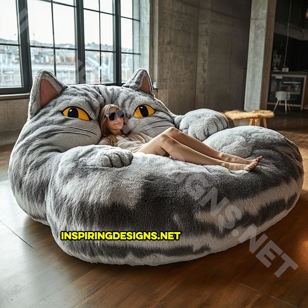 giant cat shaped lounger in a grey and white color palette