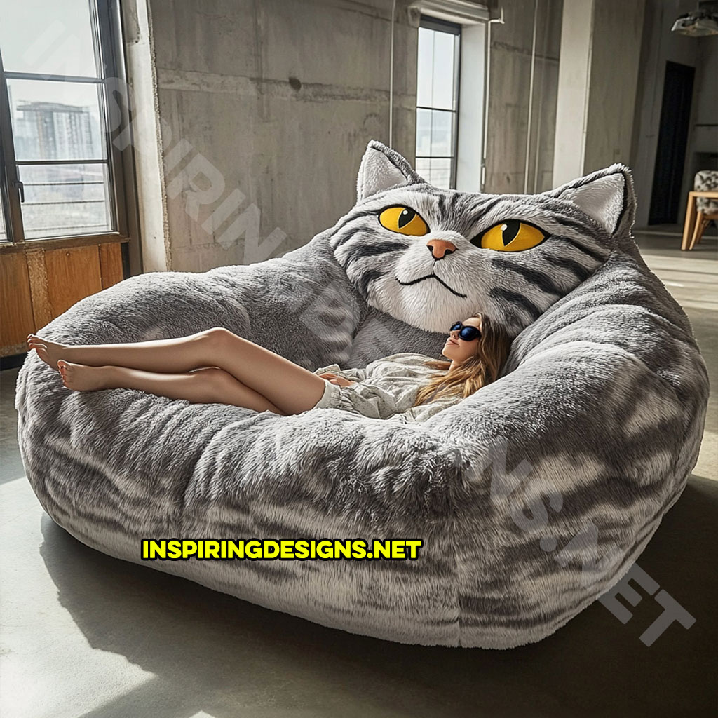 giant cat shaped lounger in a grey and white color palette