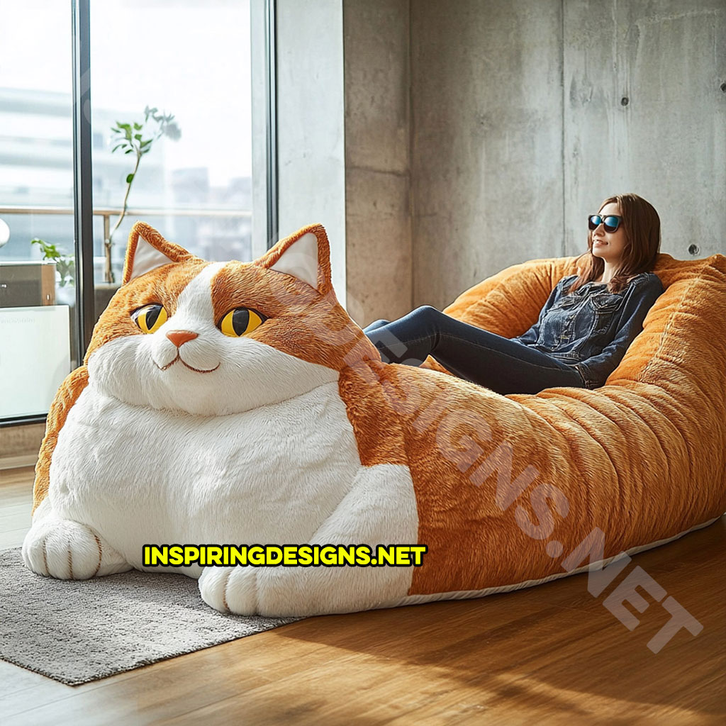 giant cat shaped lounger in a orange and white color palette