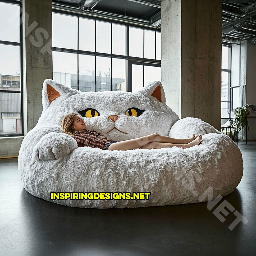 giant cat shaped lounger in a white color palette