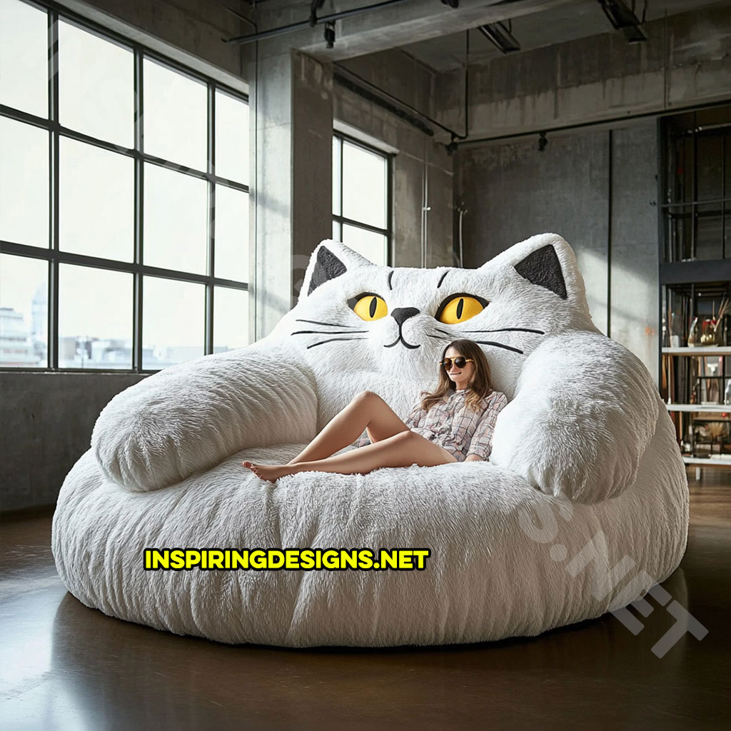 giant cat shaped lounger in a white color palette