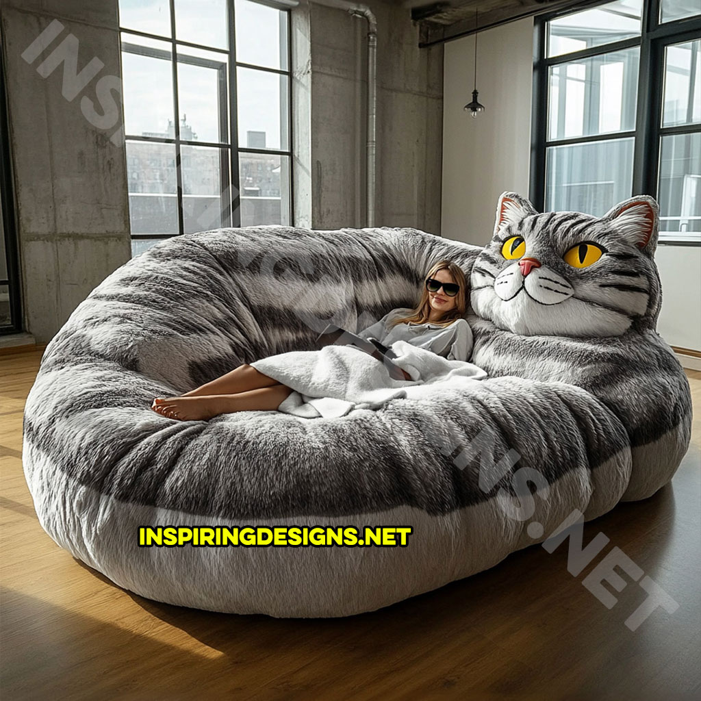 giant cat shaped lounger in a grey and white color palette