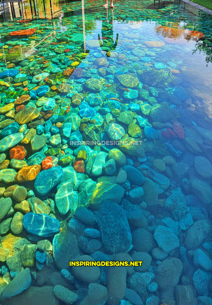 active scene patio in a pebbles in a river bed design