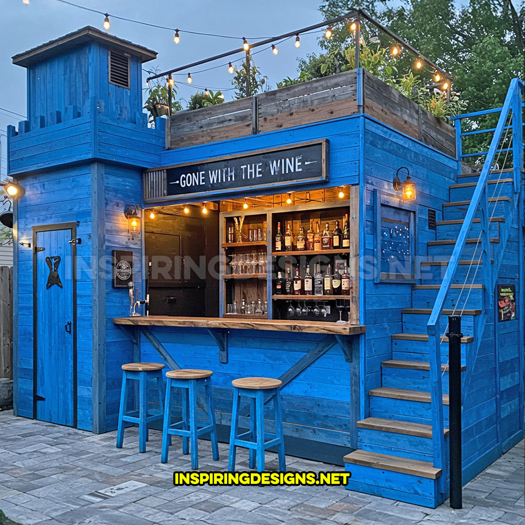 DIY backyard bar in a blue and black color palette