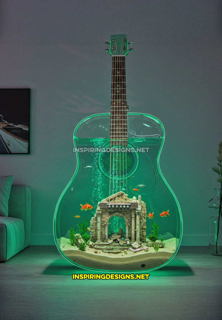 guitar aquarium in a green design with a building in ruins statue